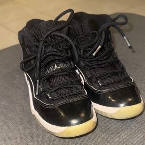 Jordan 11 Kids Black and White High-Top Sneakers